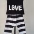 zwart/wit shirt “love” met gestreepte broek